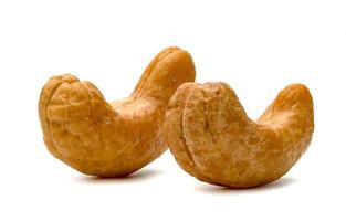 fried cashew nuts isolated on white background photo