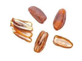 dry dates palm sliced isolated on white background. photo
