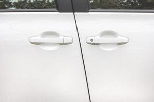 white car door handle photo
