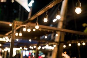 Hanging lamp with line bokeh lights background photo