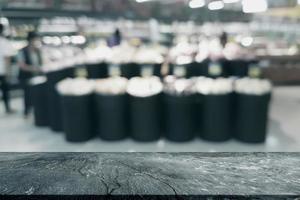 stone table with shopping mall blurred background photo