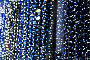 White blue bokeh lights of Christmas lights and New year photo