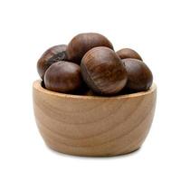 peeled roasted chestnut in wooden bowl isolated on white background photo