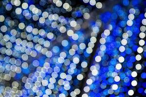 White blue bokeh lights of Christmas lights and New year photo