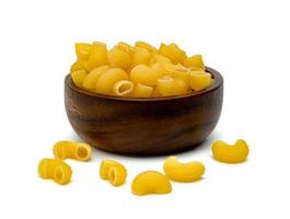 raw macaroni pasta with wooden bowl isolated on white background photo