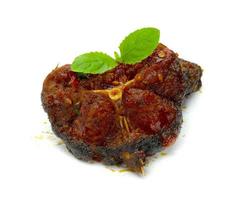 Stir Fried Crispy Catfish with Curry and leaf  fresh basil isolated on white background photo