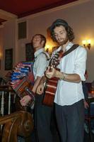 Berlin Germany, 2014. Folk singers inside a restaurant in Berlin Germany photo