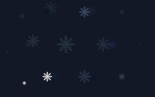 fondo de vector azul claro con copos de nieve de Navidad.