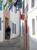 CASARES, ANDALUCIA, SPAIN - MAY 5. View of Casares in Spain on May 5, 2014. Unidentified man. photo