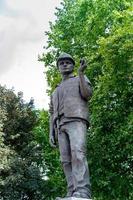 London, UK, 2014. Bronze memorial, Building Worker, near Tower Hill in London photo