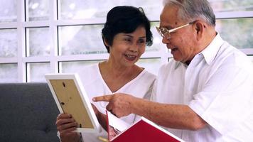 Asian elderly couple spending time together at home. photo