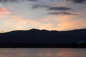 sunset, evening sky and beautiful mountains photo