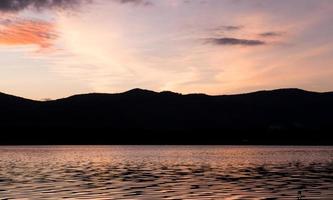 sunset, evening sky and beautiful mountains photo