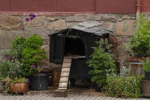 A small hen house along the street. photo