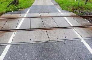 Multiple railroad tracks with junctions at a railway station in a perspective and birds view photo
