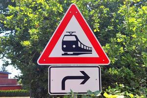 Multiple railroad tracks with junctions at a railway station in a perspective and birds view photo