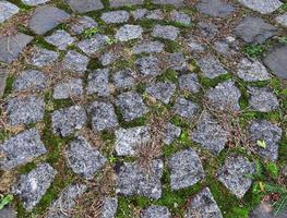 Perspective view at on old historical cobblestone roads and walkways photo