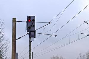 Multiple railroad tracks with junctions at a railway station in a perspective and birds view photo