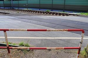 Multiple railroad tracks with junctions at a railway station in a perspective and birds view photo