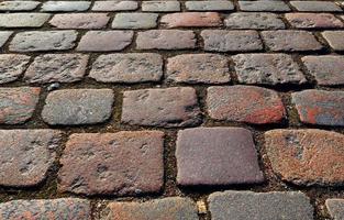 vista en perspectiva en los antiguos caminos y pasarelas empedradas históricas foto