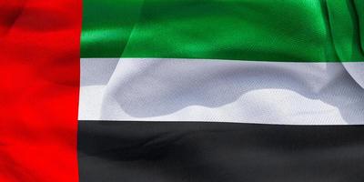 united arab emirates flag - realistic waving fabric flag photo