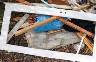 Environmental pollution found at a street where someone dumped its rubbish photo