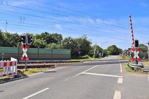 Multiple railroad tracks with junctions at a railway station in a perspective and birds view photo