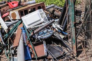 Environmental pollution found at a street where someone dumped its rubbish photo