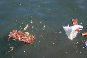 Environmental pollution found at a street where someone dumped its rubbish photo