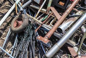 Environmental pollution found at a street where someone dumped its rubbish photo