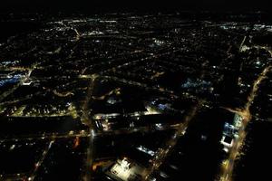 Night Aerial View of Illuminated British City. Drone's Footage of Luton Town of England at Night photo