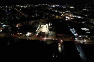 Night Aerial View of Illuminated British City. Drone's Footage of Luton Town of England at Night photo