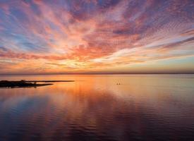 Pier on Mobile Bay at sunset photo