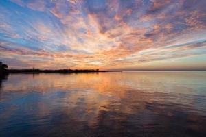 Pier on Mobile Bay at sunset photo