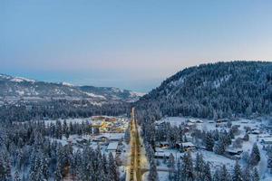 Aerial view of Leavenworth, Washington at sunset in December of 2021 photo