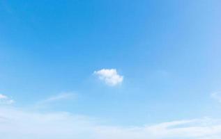 blue sky background with white clouds cumulus floating soft focus. photo