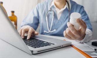 Double exposure of technology healthcare And Medicine concept. Doctors using digital tablet and modern virtual screen interface icons panoramic banner, blurred background. photo