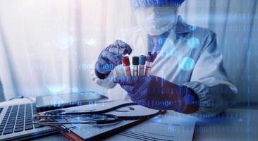 Medicine doctor hand working on a patients x-ray scans digital healthcare and connection with modern virtual screen interface icons, Medical technology and network concept. photo