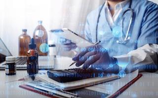 Double exposure of technology healthcare And Medicine concept. Doctors using digital tablet and modern virtual screen interface icons panoramic banner, blurred background. photo