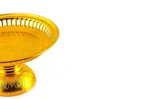 Golden Tray whit pedestal on Isolated white background photo