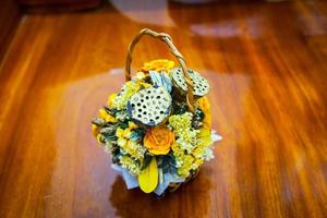 Dried floral bouquet in a basket photo