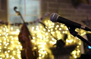 Lights and instruments - selective focus on microphone before the concert photo