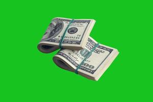 fajo de billetes de dólar estadounidense aislado en verde chroma keyer. paquete de dinero americano con alta resolución en máscara verde perfecta foto