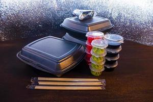 Set of delicious sushi rolls with wassabi and ginger in a box. Japanese food. photo