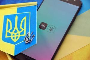 Diia app on smartphone screen. Diya is a mobile application with web portal and a brand of e-governance in Ukraine photo
