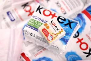 Kotex production with logo. Kotex is a brand of feminine hygiene products, includes maxi, thin and ultra thin pads. photo