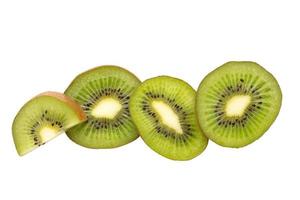 Kiwi fruit slices on white background. photo