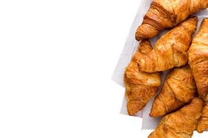 Tasty buttery croissants on old graye table. photo