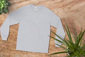 Blanks T-Shirt on Wood Background, Empty T-Shirt, T-Shirt Mockup photo