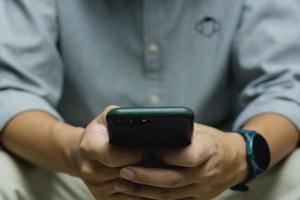 man using point finger on screen mobile smart phone.Business technology digital internet network concept. photo